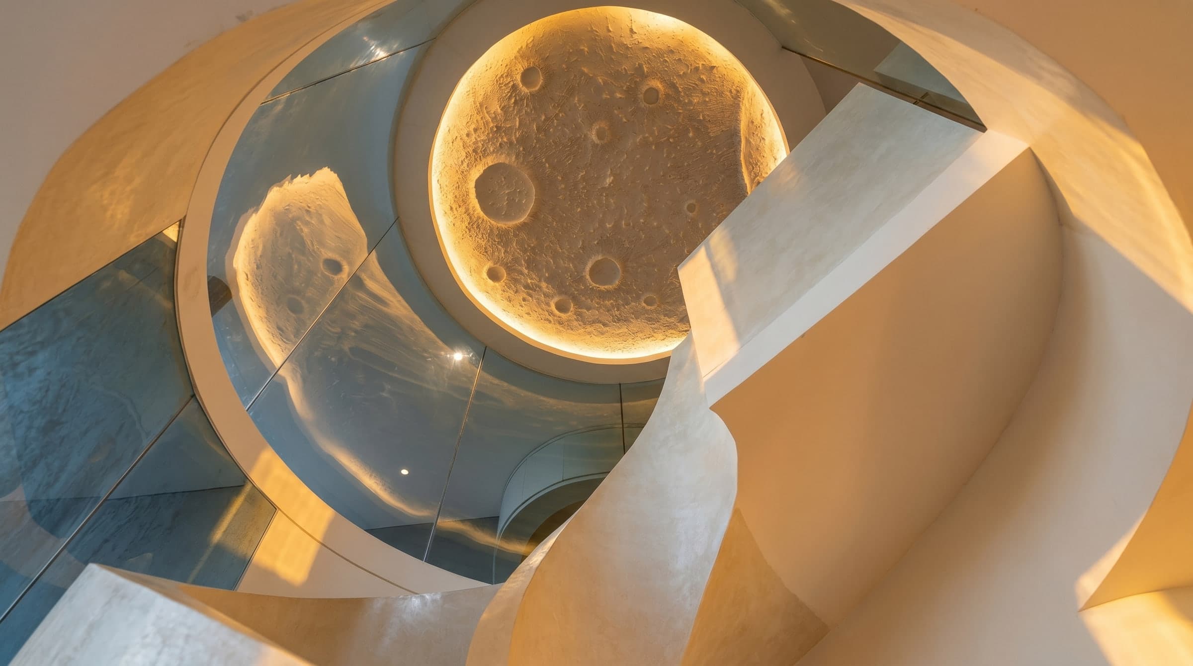 GLAZE interior — a sculptural moon set into the ceiling